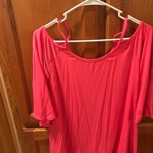 Spaghetti strap top with sleeves.